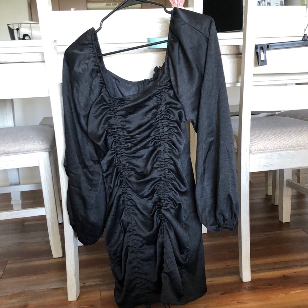 Black long sleeved ruffle dress